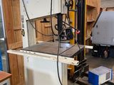 a machine that is sitting on a pallet in a warehouse