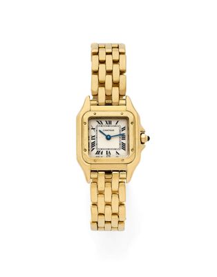 une montre Cartier pour femme, avec un bracelet en or et des chiffres romains