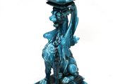 a blue candle holder with a statue on top of it