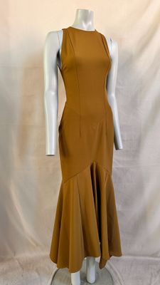 the mannequin is wearing a brown dress on a white mannequin