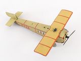 a model of a small plane on a white surface