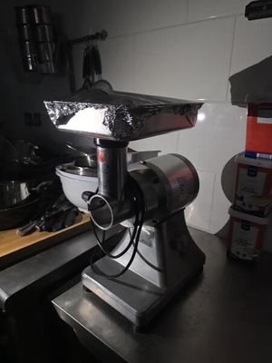 a machine that is sitting on a counter in a kitchen