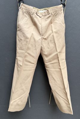 an image of a pair of pants hanging on a hanger