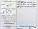 une photo d'un document sur laquelle figure la photo d'un homme