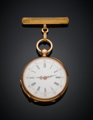 une image représentant une montre de poche en or sur fond noir