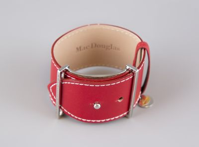 leather watch band with silver buckle and red stitching