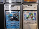 a lot of different pokemon cards on the table