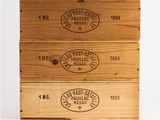 three wooden boxes that are stacked on top of each other