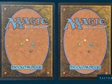 two cards with different designs on them on a blue background