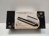 packaging of remington pearl hair straightener in a box on a table