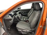 the interior of a car with the door open showing the driver ' s seat