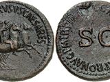 a close up of a coin with a horse and rider on it