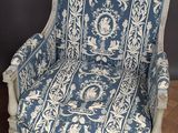 pair of blue and white upholstered armchairs