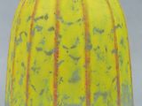a yellow vase with a red stripe on it