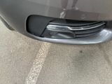 a close up of the front bumper of a car