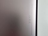 a close up of a silver refrigerator freezer sitting on top of a counter