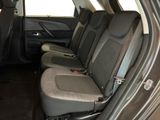 four seats in the back of a car that are empty