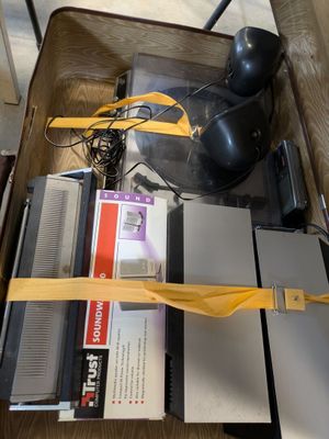 a piece of luggage that has a bunch of electronics inside of it