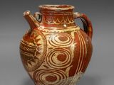 an image of a vase with a design on it
