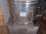 an image of a stainless steel mixing machine in a kitchen