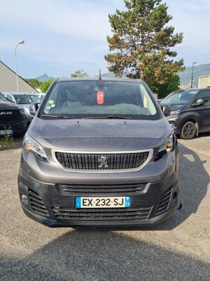 a small car that is parked in a parking lot