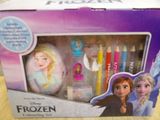 disney frozen pencil set in a box on a wooden table