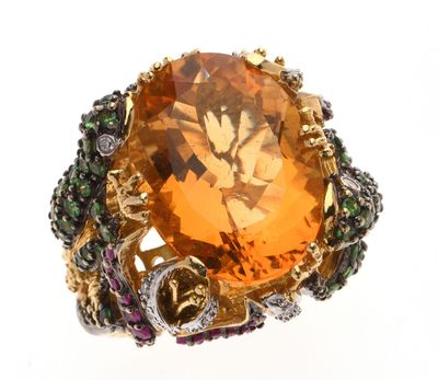 Importante BAGUE cocktail en or jaune 750 °/°° centrée d'une…