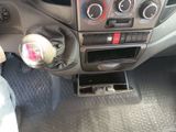 a picture of a car dashboard with a cup holder in it