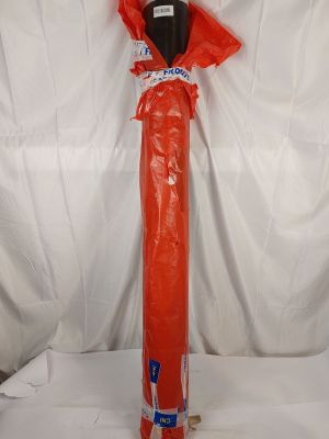 a red fire extinguisor on display on a white background