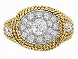 a yellow gold and white gold ring with diamonds