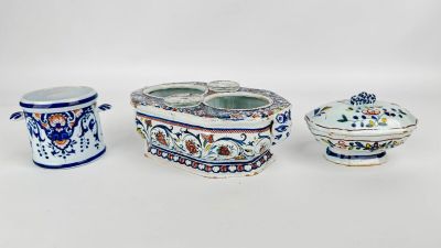 several different types of ceramic items are displayed on a white surface