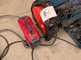 many tools that are sitting on the floor next to each other