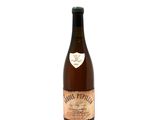an image of a bottle of wine sitting on top of a white table