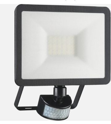 une image représentant un projecteur noir sur fond blanc