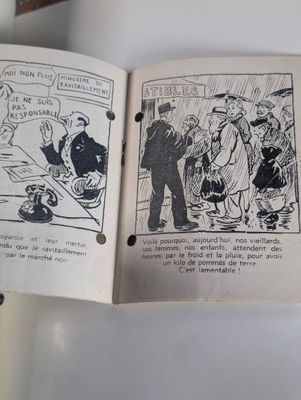 an open book with a picture of a man talking to a woman