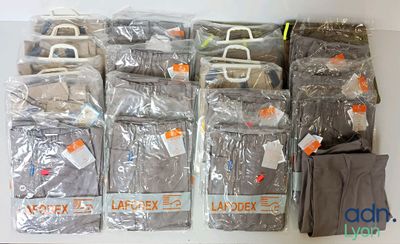 many bags of luggage sitting on a table