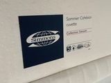 a close up of a mattress with a label on it