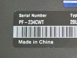 a label on the back of a laptop that reads serial number