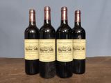three bottles of wine sitting on top of a wooden table