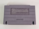 an old nintendo game console sitting on top of a white table