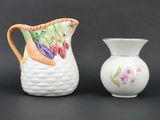 two vases that are sitting next to each other