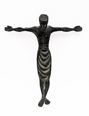 statue of a man with arms outstretched in the air