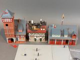 a lot of toy buildings that are on a table