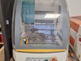 a machine that is sitting on a table in a room