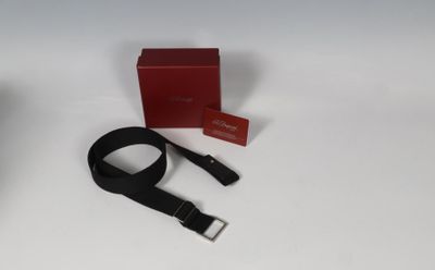 an image of a black belt and a red box on a white surface