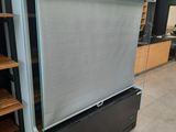 an image of a refrigerator in a store with shelves and shelves