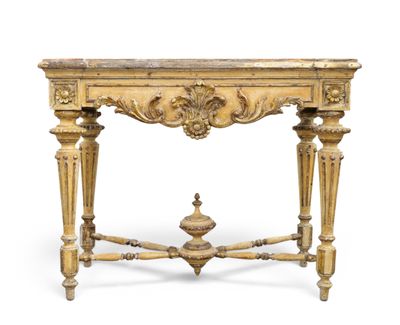 an antique console table with a marble top and ornate carvings