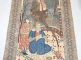 an antique persian rug with a painting of a woman and a man on a horse