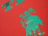 the red book has a green logo on it