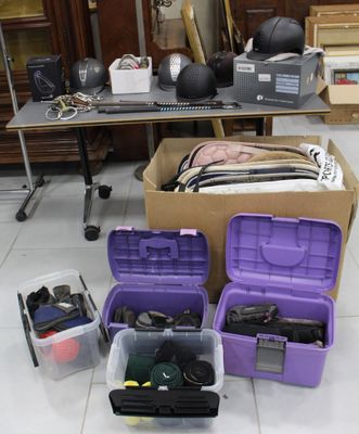 many items in a box on the floor in the room
